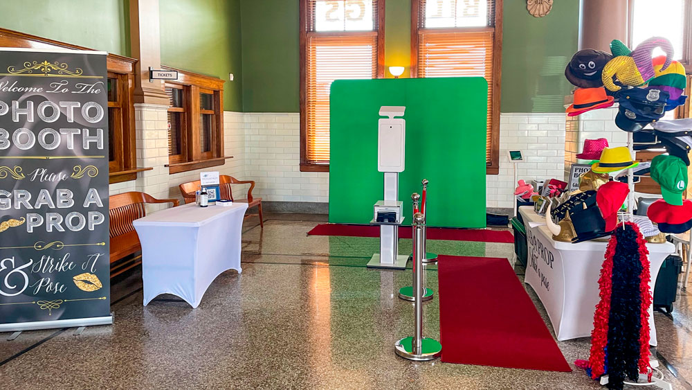 Indoor glam booth setup with green screen